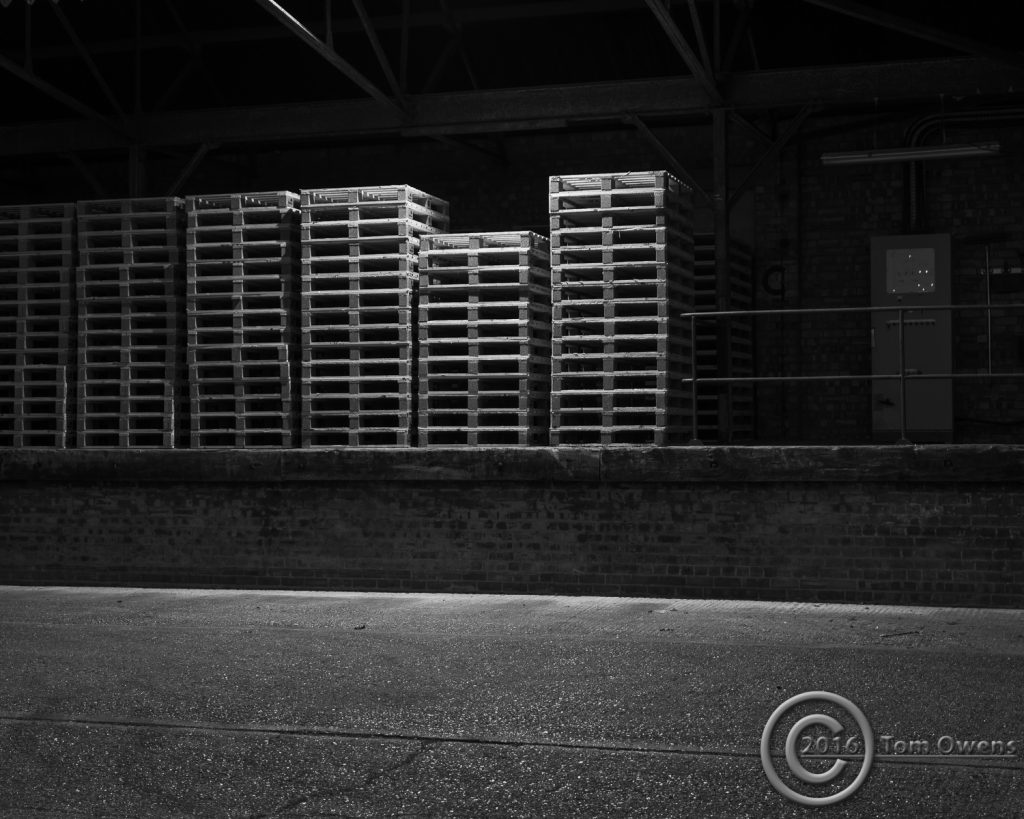 Stacked pallets on loading bay