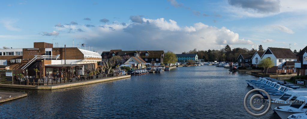 A view downriver from Wroxham Bridge at tea time