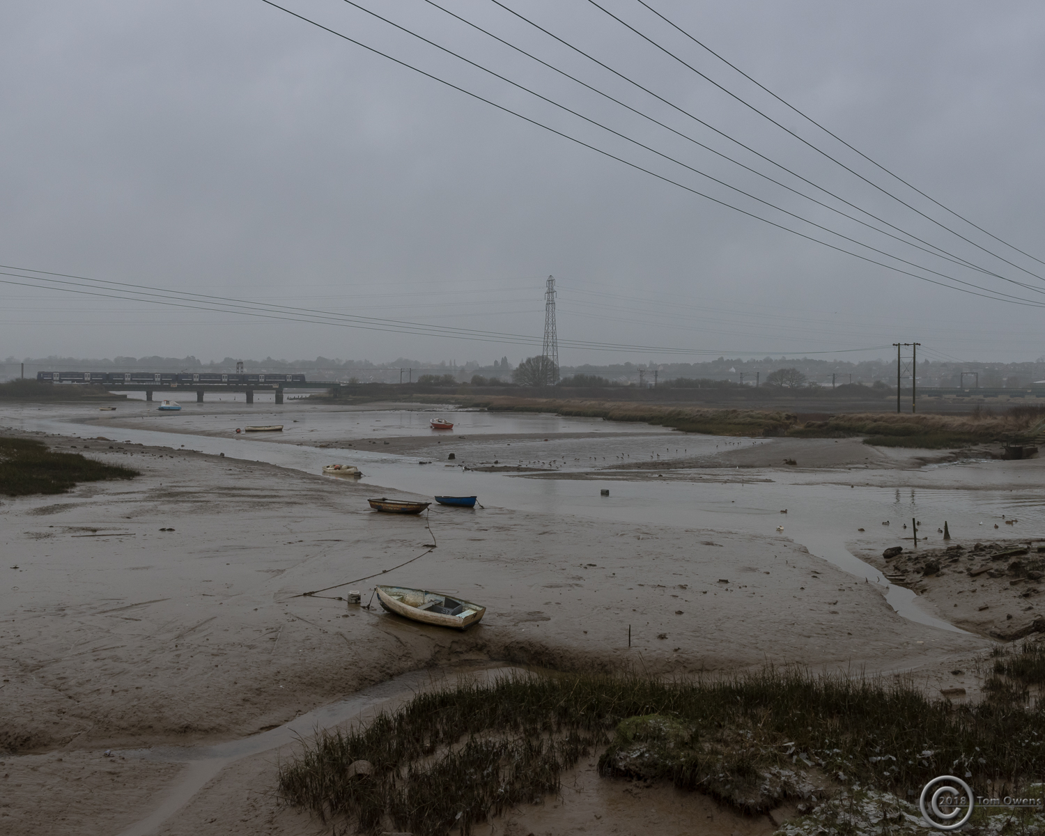 Low tide, mud boats and cracked ice